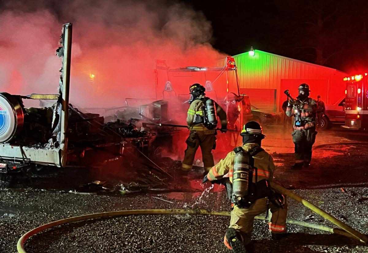 Benton County deputies and firefighters with Kennewick and Benton County District 1 fight a motorhome blaze in Finley that injured a woman.