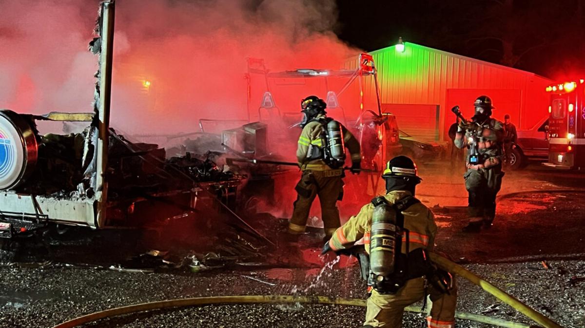 Benton County deputies and firefighters with Kennewick and Benton County District 1 fight a motorhome blaze in Finley that injured a woman.