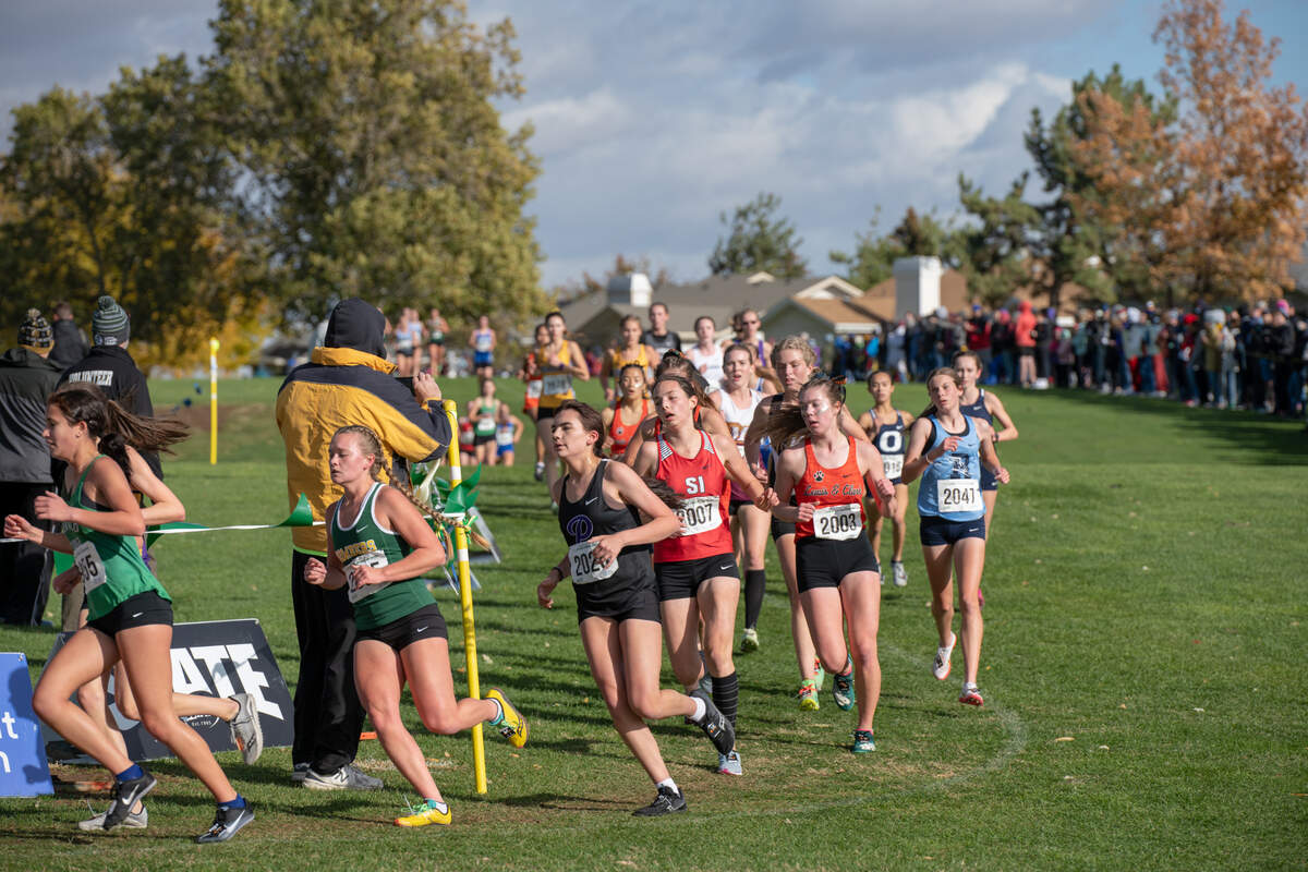 About 1,000 teens competed in the wind Saturday at Sun Willows Golf Course in Pasco in the WIAA State High School Cross Country championships.