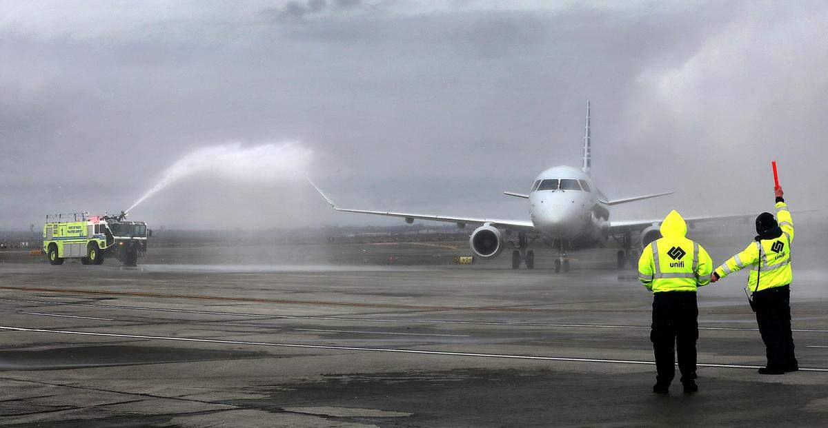 The inaugural American Airlines flight with new non-stop service to Phoenix receives a water cannon salute from the Pasco Fire Department Thursday in Pasco.