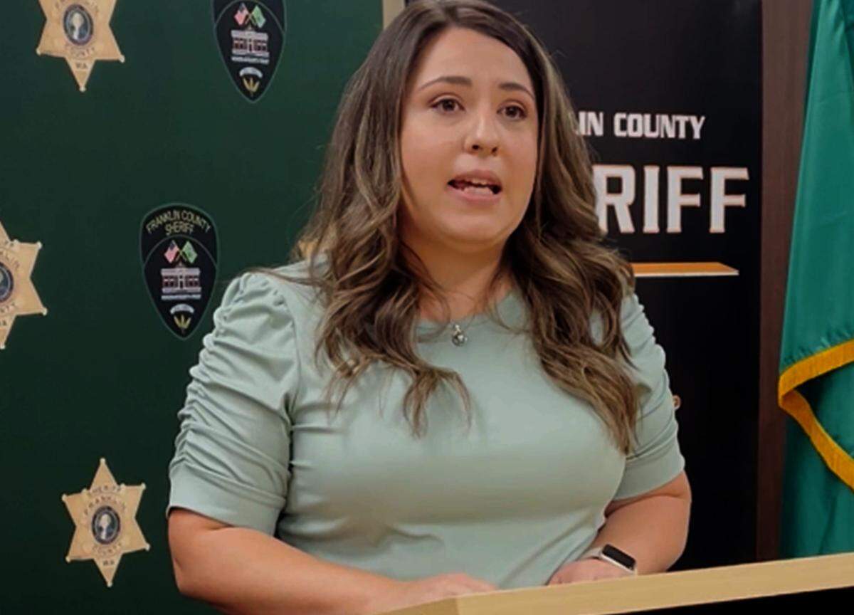 Nikki Cook, the younger sister of murder victim Anna Pelayo, speaks after Franklin County Sheriff Jim Raymond announced the arrest of a suspect in the 1997 murder.