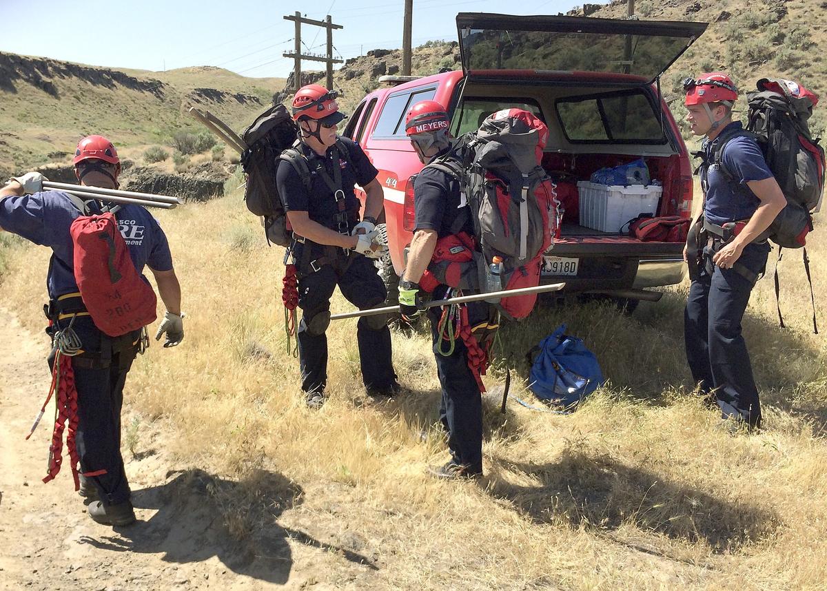 Members of the  Pasco Fire Department technical rescue team prepares for one of their rescues at Palouse Falls State Park. Watch a video at: tricityherald.com/video