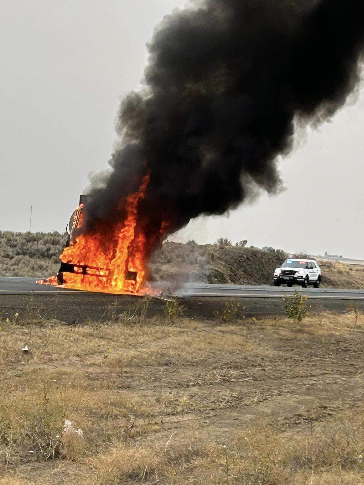 A chase stretching more than 30 miles ended with a Washington State Department of Transportation Asphalt truck bursting into flames on Interstate 90.