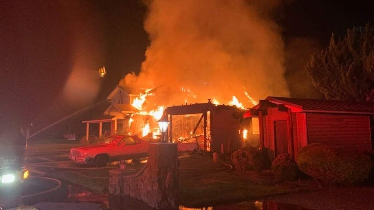 A dramatic fire destroyed a south Richland home on View Drive early Tuesday. The occupant was able to escape because of working smoke alarms.