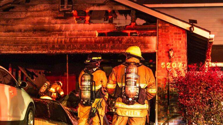 Early morning fire heavily damages West Richland home