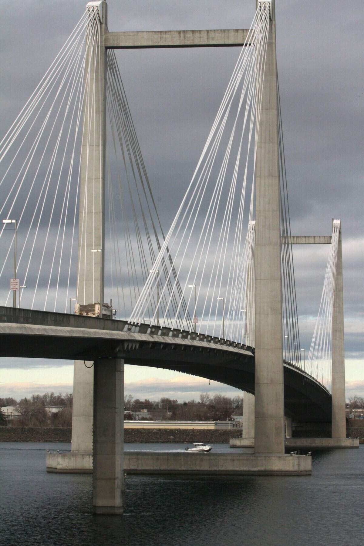 The gun tossed from the stolen car was found three hours later by a work release inmate crossing the bridge on his way back to the Benton County jail from his job in Pasco.