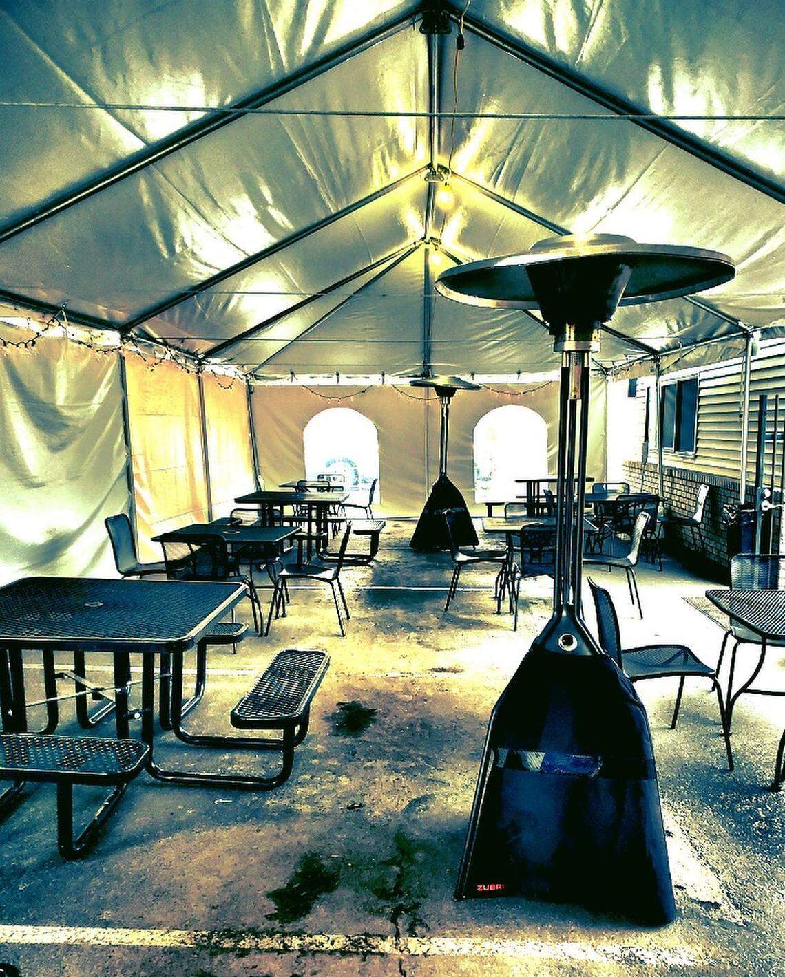 The Dugout with three locations - one each in Kennewick, Pasco and Richland - has adapted their outside seating with an enclosed tent and outdoor heaters.