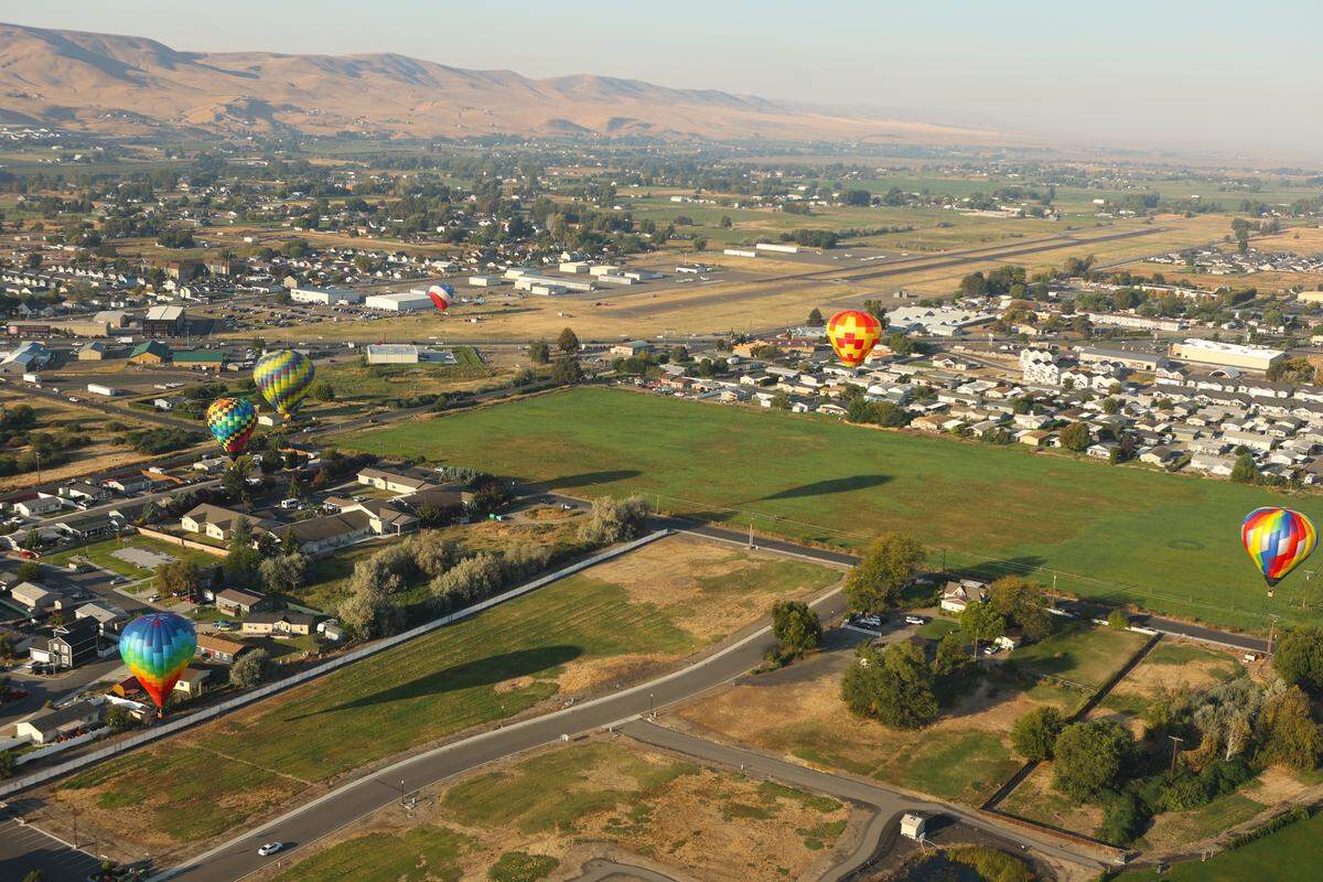 Balloons float up at the Great Prosser Ballon Rally Friday.