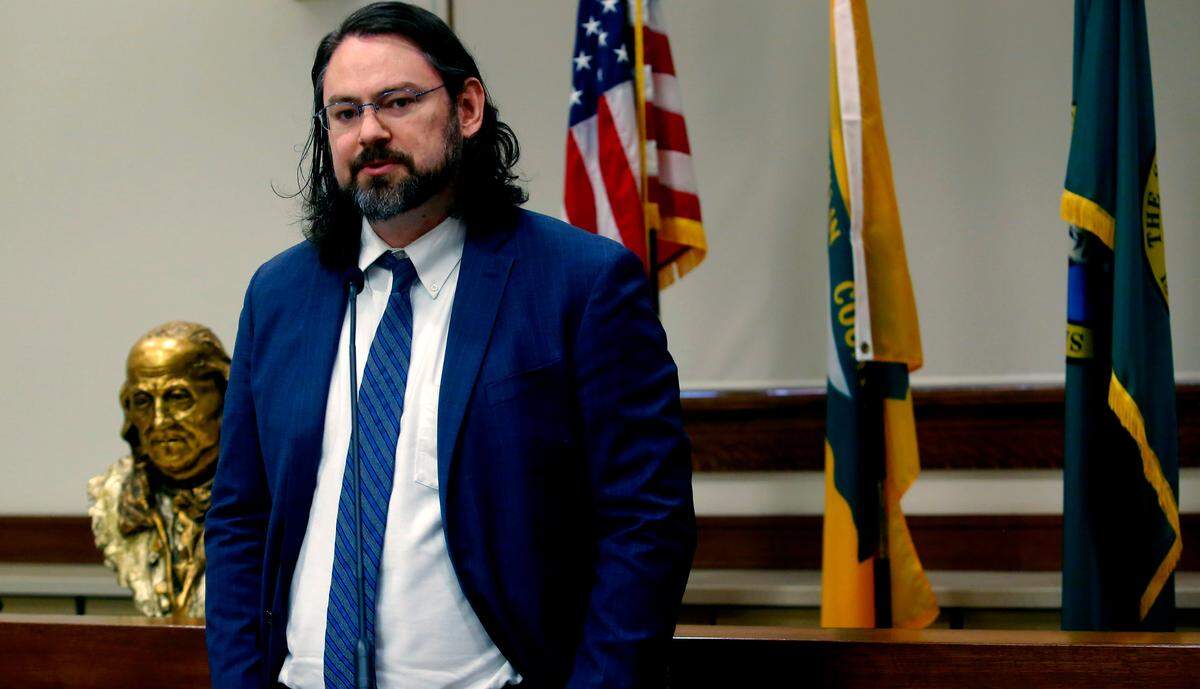 Franklin County deputy prosecutor Daniel Stovern speaks during a news conference discussing the crumbling Washington state public defense system.