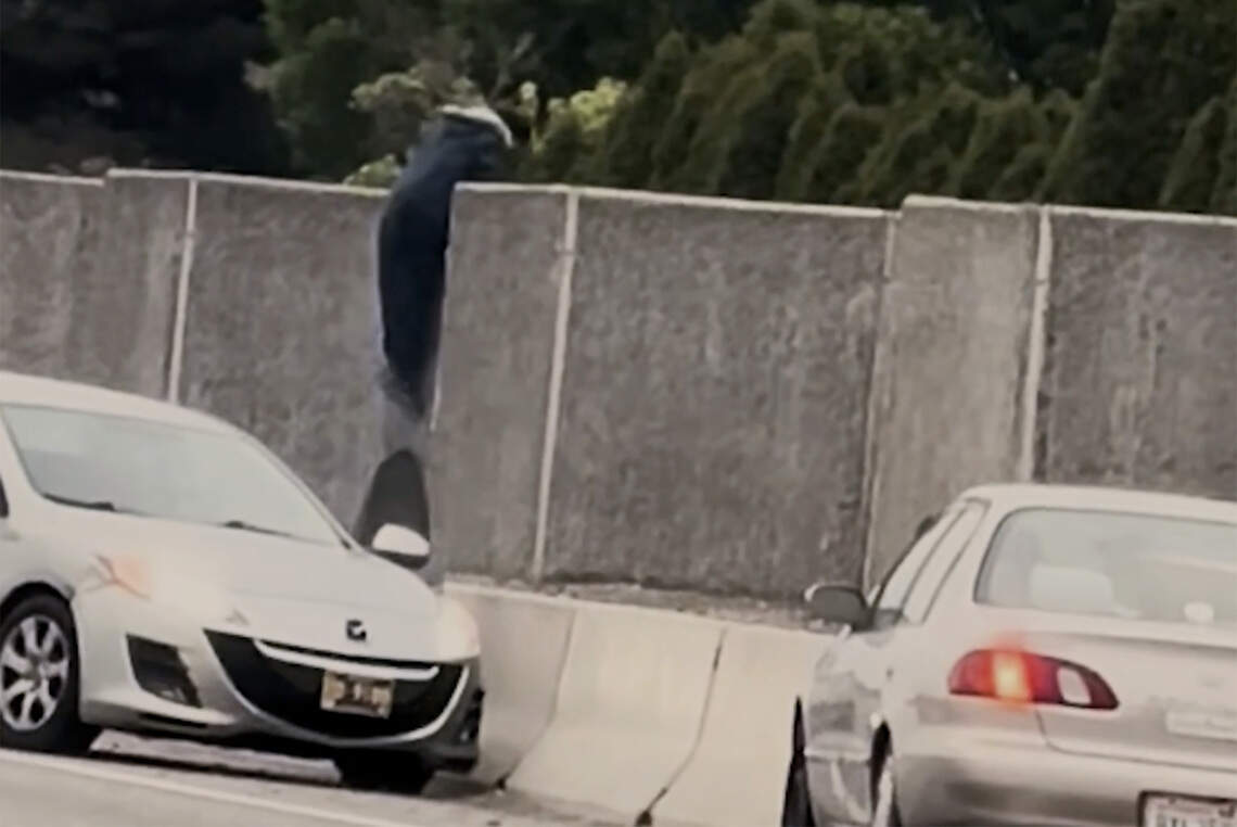 A suspect jumps over an 8-foot wall along Highway 240 trying to flee from Washington State Patrol troopers in Richland. Chasing Chaos: