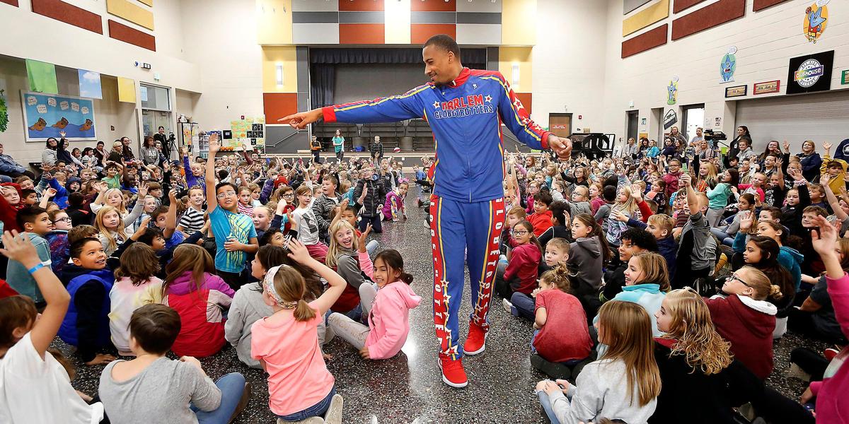 Julian “Zeus” McClurkin of the Harlem Globetrotters picks a volunteer participant for Friday’s anti-bullying assembly from the approximate 700 students at the Amon Creek Elementary School. Watch a video at: tricityherald.com/video
