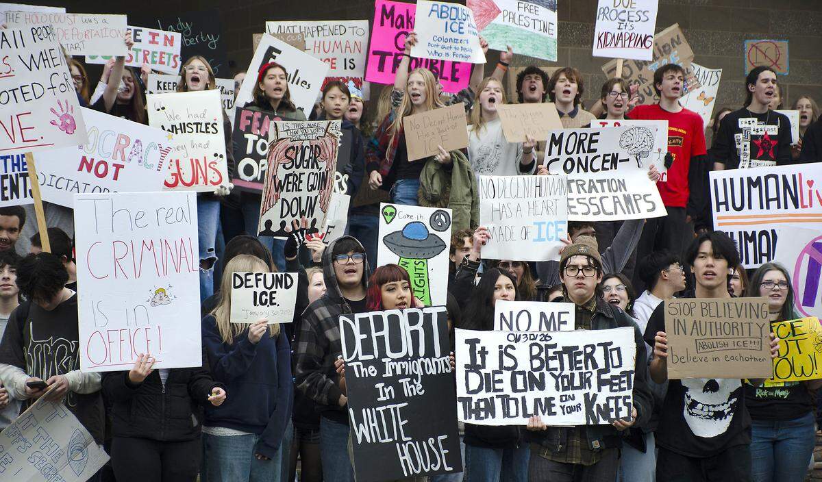 Students from Richland and Hanford High School participate in Friday's walkouts and marches on public sidewalks to protest federal ICE immigration enforcement. They walked from their schools to John Dam Plaza.