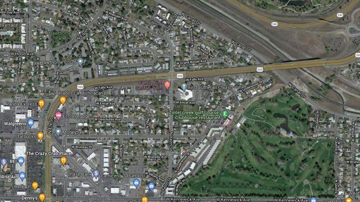 Kennewick police are searching for the person who was driving a sedan and opened fire on another driver near the intersection of Yelm Street and Highway 395.