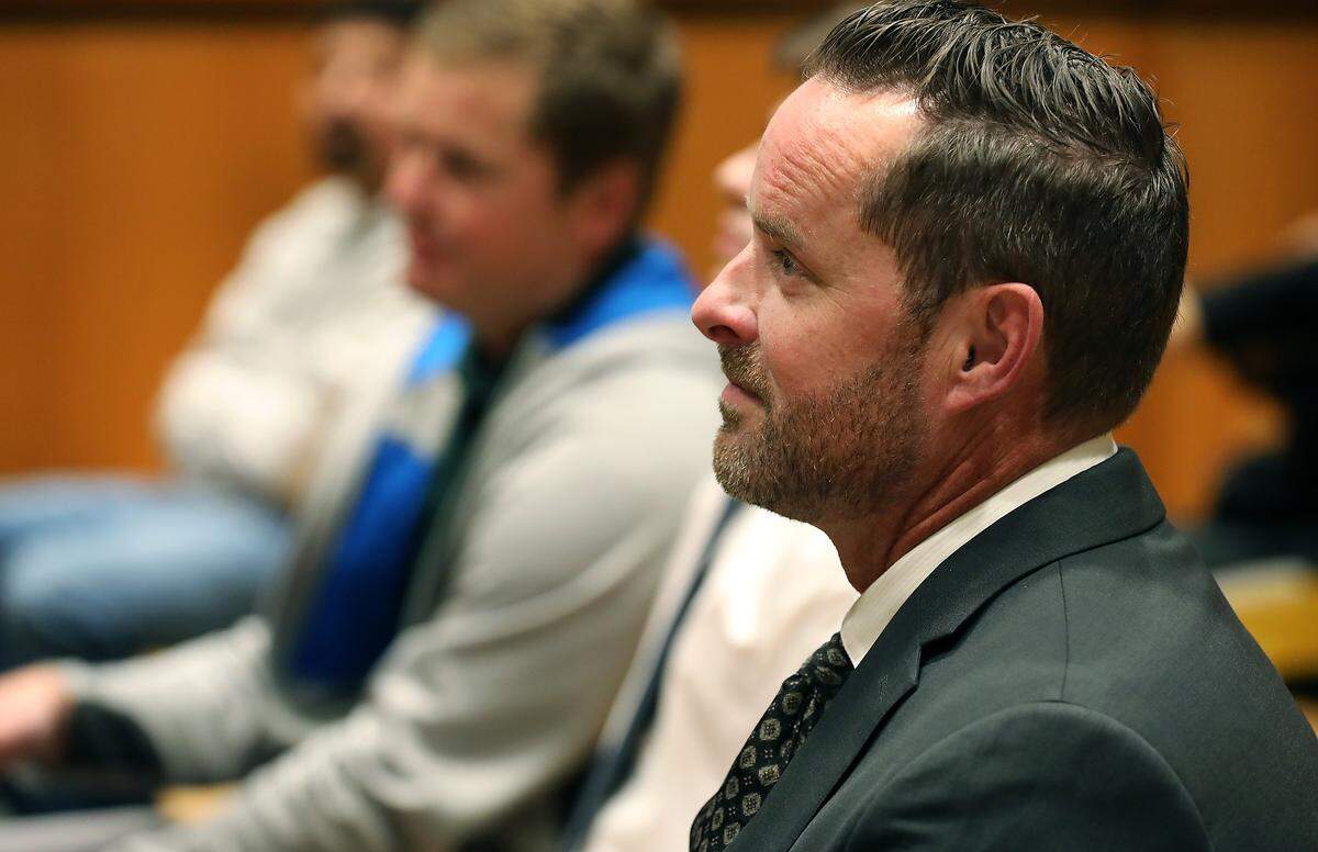 Benton County Commissioner Will McKay sits in a Benton County Superior Courtroom, waiting for a hearing in October 2025.