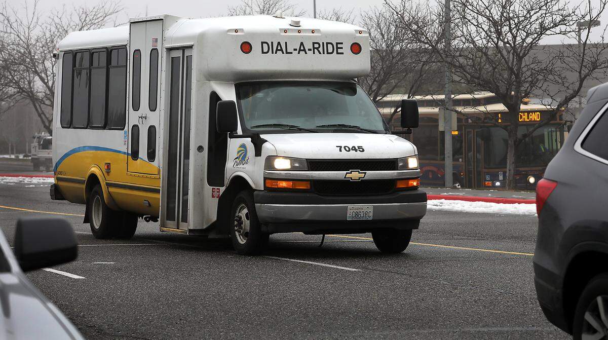 A Ben Franklin Transit Dial-A-Ride sits in the parking lot near the Toyota Center in Kennewick.