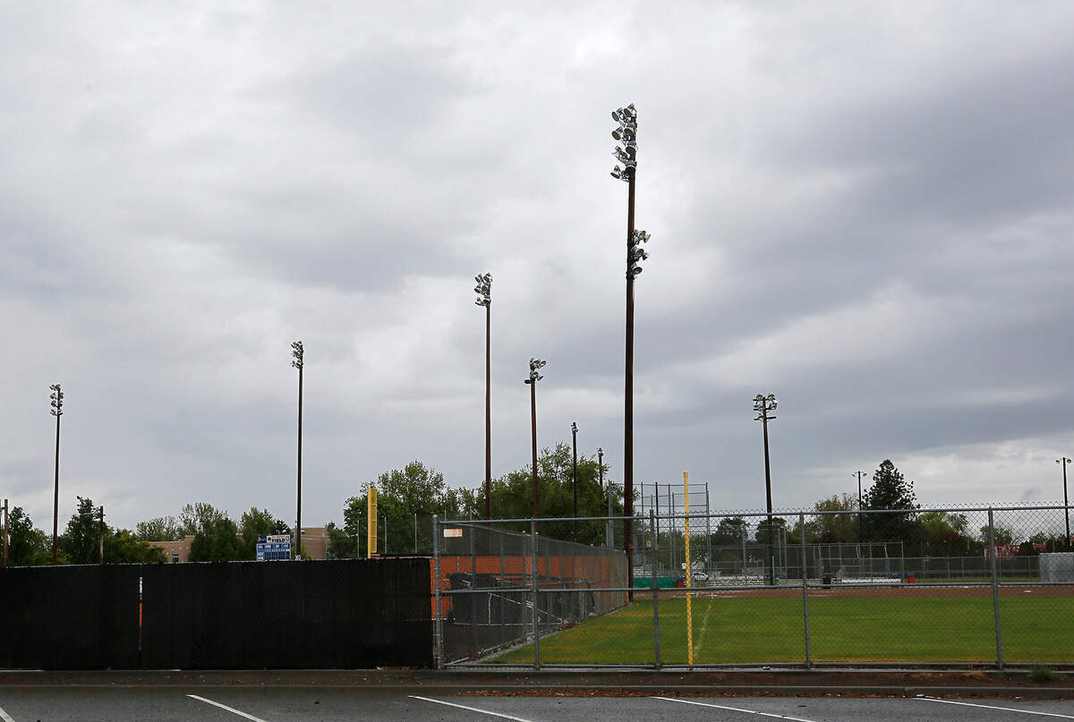 School and city officials are concerned about the safety of a field lighting pole that is between Roy Johnson Field and the civic softball field in downtown Kennewick. They have moved a playoff game by the Lions team to a Pasco venue.