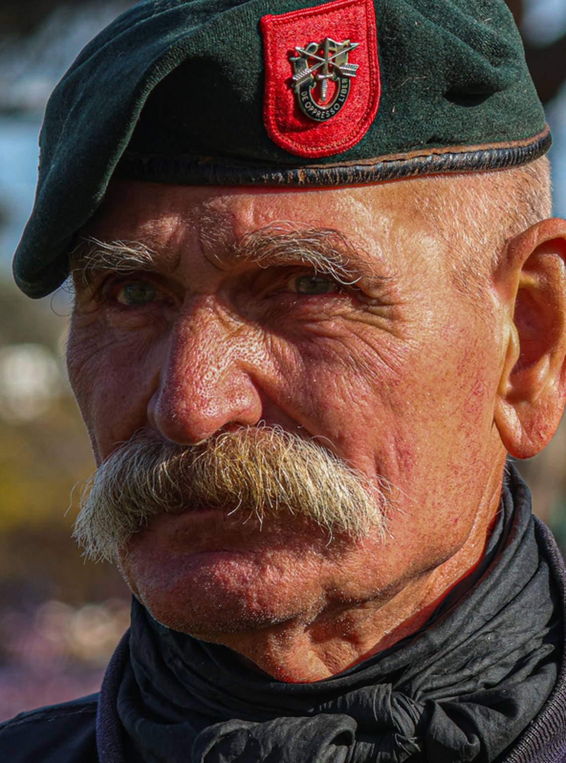 Brent Long, a U.S. Army Special Forces veteran, watches the 26th annual Tri-Cities Veterans Day Parade in West Richland, Wash., on Saturday, Nov. 8, 2025.
