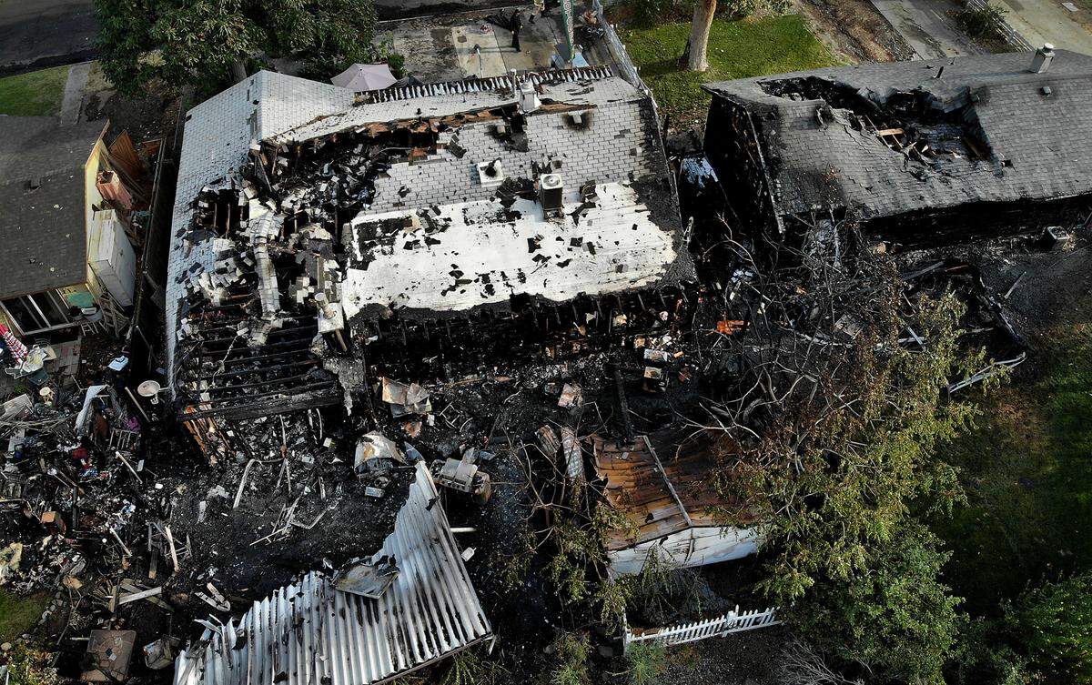 Fire investigators from the Richland Fire Department are searching for clues to the cause of an overnight two-alarm blaze that destroyed two homes in the 2300 block of Boulder Street in Richland. Fire officials said no injuries were reported.