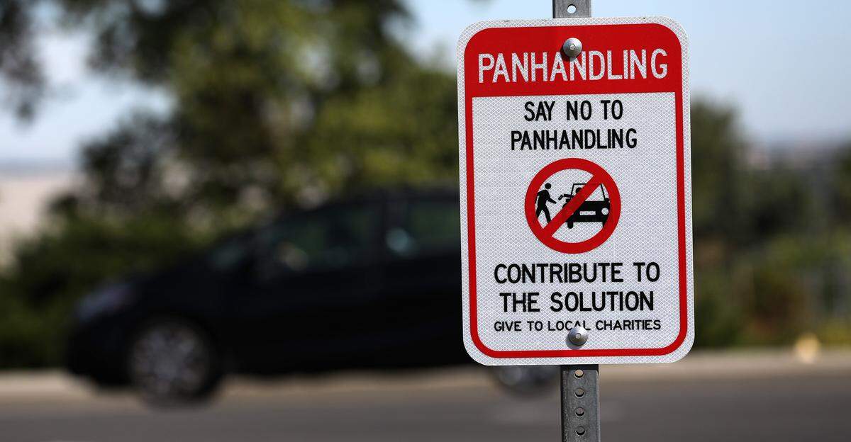 The city of Kennewick has posted signs discouraging panhandlers at various intersections around the town, including the no sit-lie ordinance area on West Clearwater Avenue.