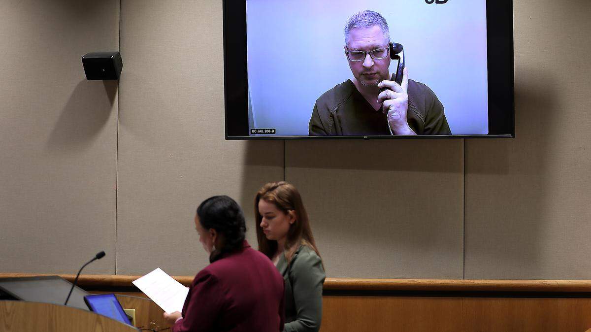 Tri-Cities paraeducator Kevin R. Johnson, 54, appears via video for his preliminary hearing in Benton County Superior Court in April 2026 on charges of using AI software to make child pornography.