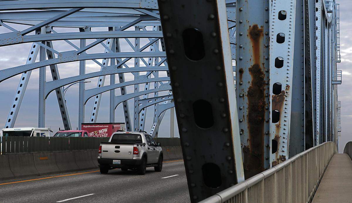 Faded paint and rust are showing on the girders of the four-lane blue bridge, also known as the Pioneer Memorial Bridge. It carries Highway 395 over the Columbia River, linking Pasco and Kennewick. The last time it was repainted was in 1995 for $1.8 million