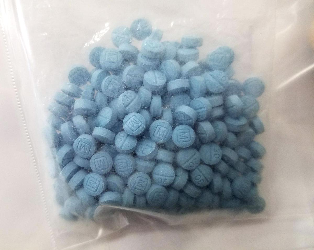 Multiple “mexis” of fentanyl tablets seized in previous Tri-Cities drug investigations.