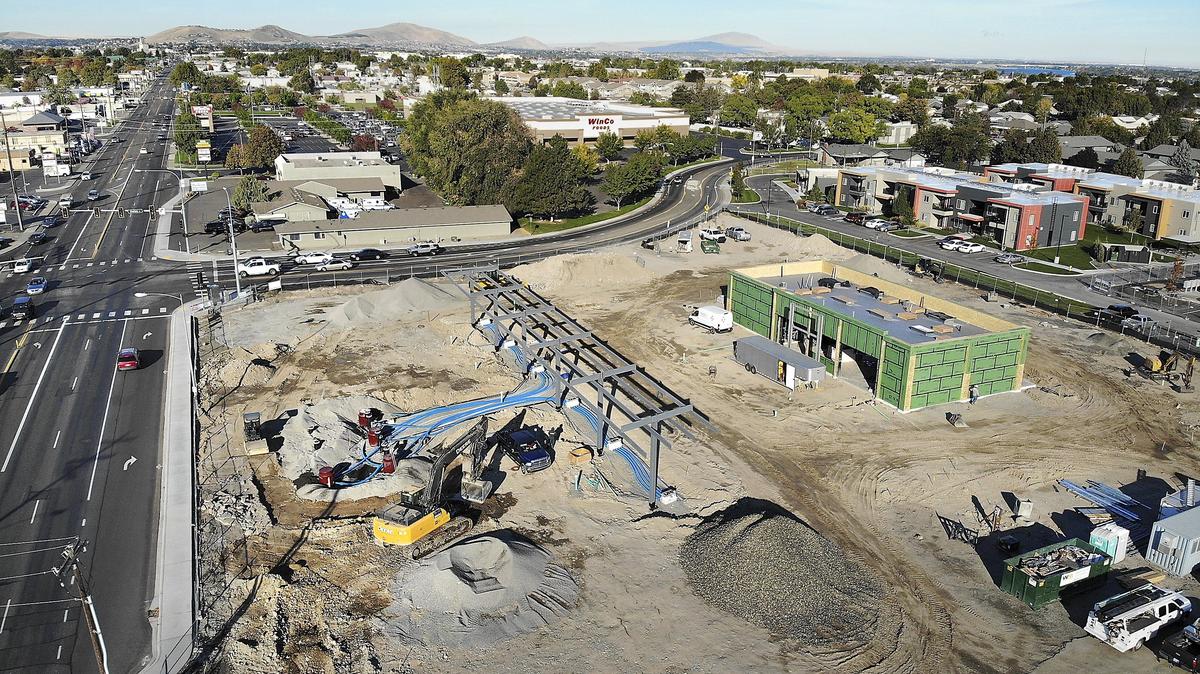 Heavy equipment and construction workers move about Wednesday morning at the construction site for the new Maverik Adventure’s First Stop gas station and convenience store at 4306 W. Clearwater Ave. in Kennewick. The new business with 6 fuel dispenser pumps, including diesel, and a 4,300-square-foot convenience store building is expected to open in mid-December, according to a construction site supervisor. There are currently three other of the gas stations operating in the Tri-Cities. The chain has stores in Arizona, Colorado, Idaho, Montana, Nebraska, Nevada, Oregon, Utah, Wyoming and Washington.