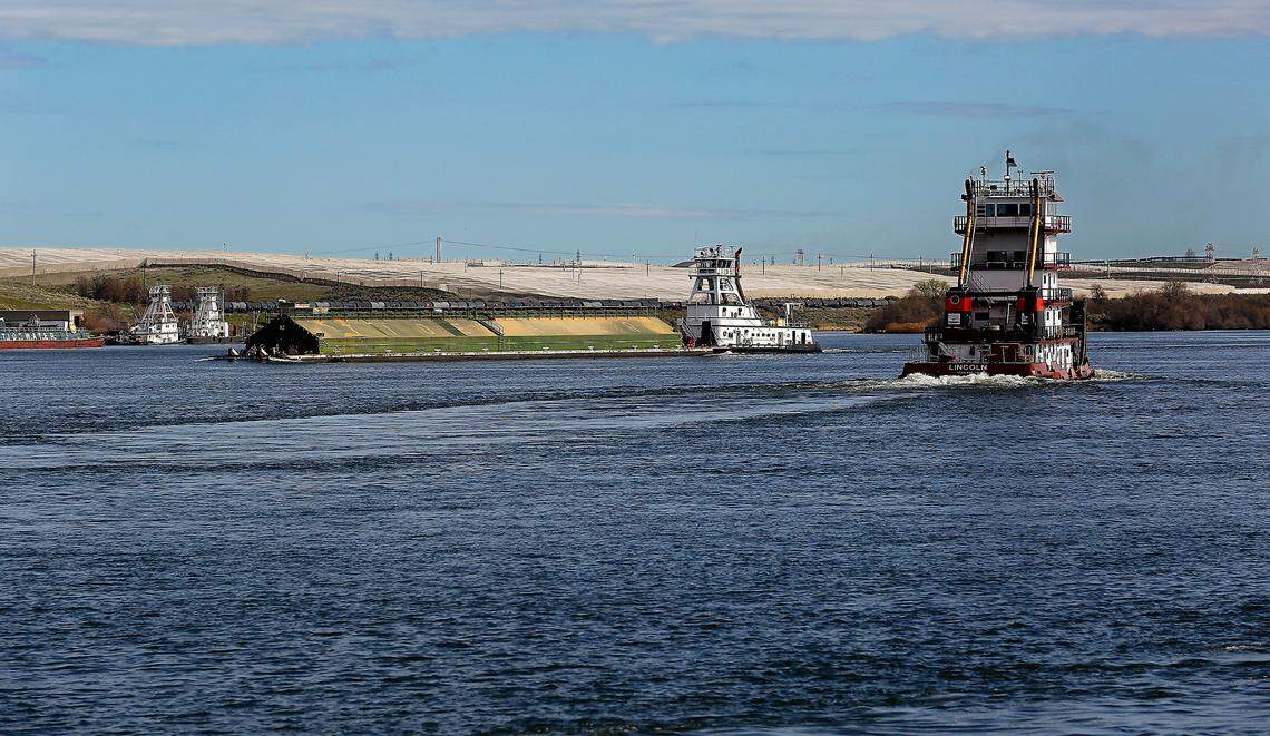 A loaded grain barge headed down the Snake River passes a tugboat headed upriver in Burbank near the confluence with the Columbia River. The Tri-Cities accounts for about 17% of all exports in the state, according to TRIDEC. That comes out to about $15 billion worth of goods exported annually by Tri-Cities industries, of the state’s $90 billion in exports.