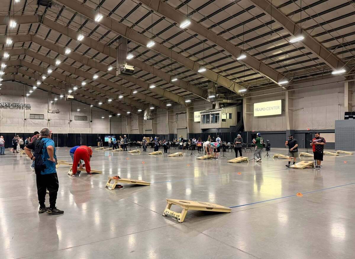 A previous cornhole event with the 3 City Slingers took place in the HAPO Center.