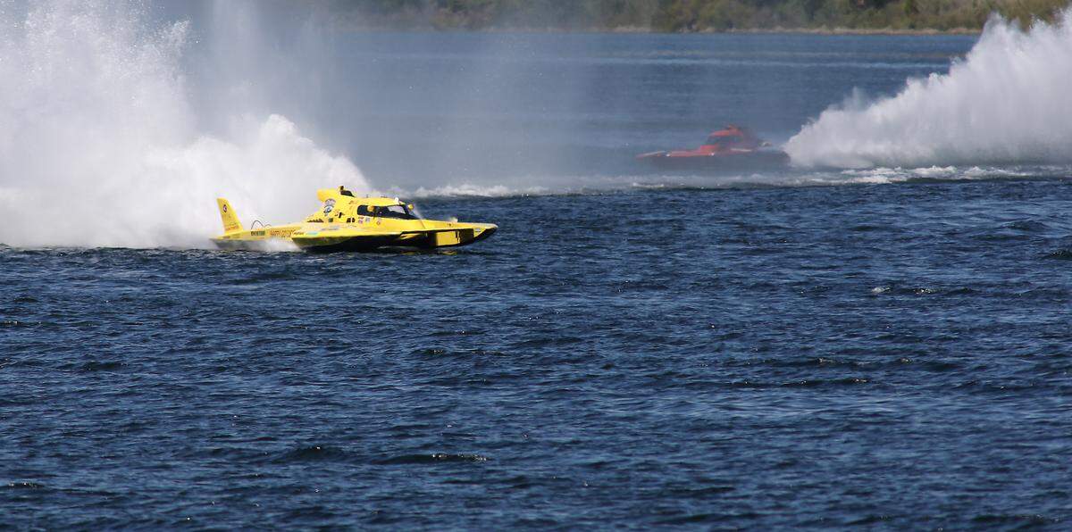 Greg Hopp in the GP-15 racing hydroplane heads to the finish line in front of Jeff Bernard in the GP-79 during Heat 3A Sunday on the Columbia River during the annual summer Water Follies boat races and air show event.