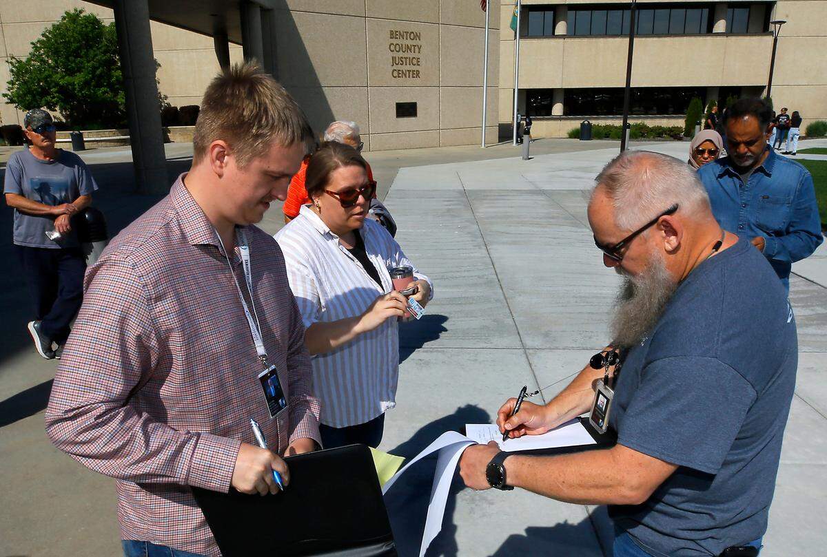 The public auction at the Benton County Justice Center in Kennewick of the Farmers Exchange properties in downtown Kennewick in 2025.