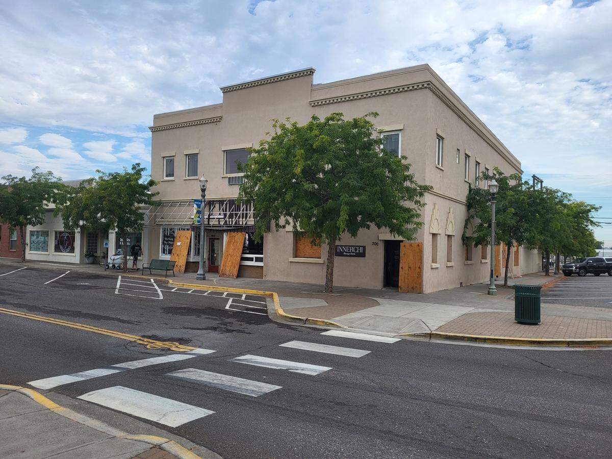 The new owners of the twice-burned Cascade Building in Kennewick receive permits to begin renovation work.