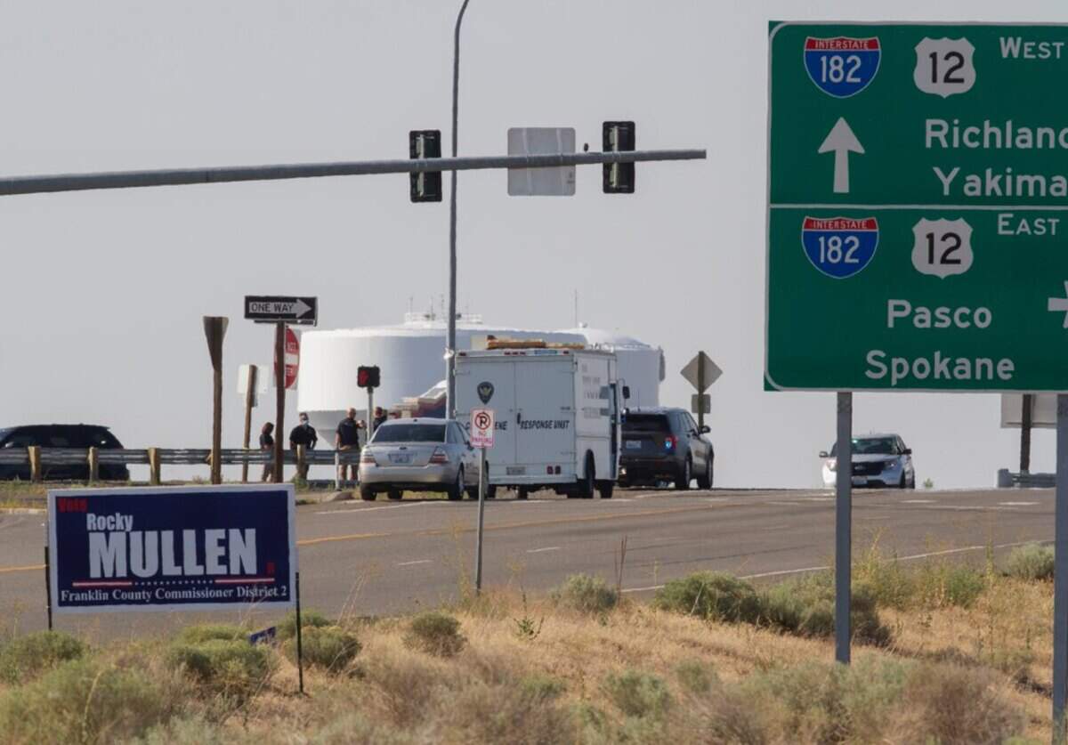 Police investigate an officer-involved shooting that occurred during a traffic stop on the Interstate 182 ramp from Road 68 in Pasco in July 2020.