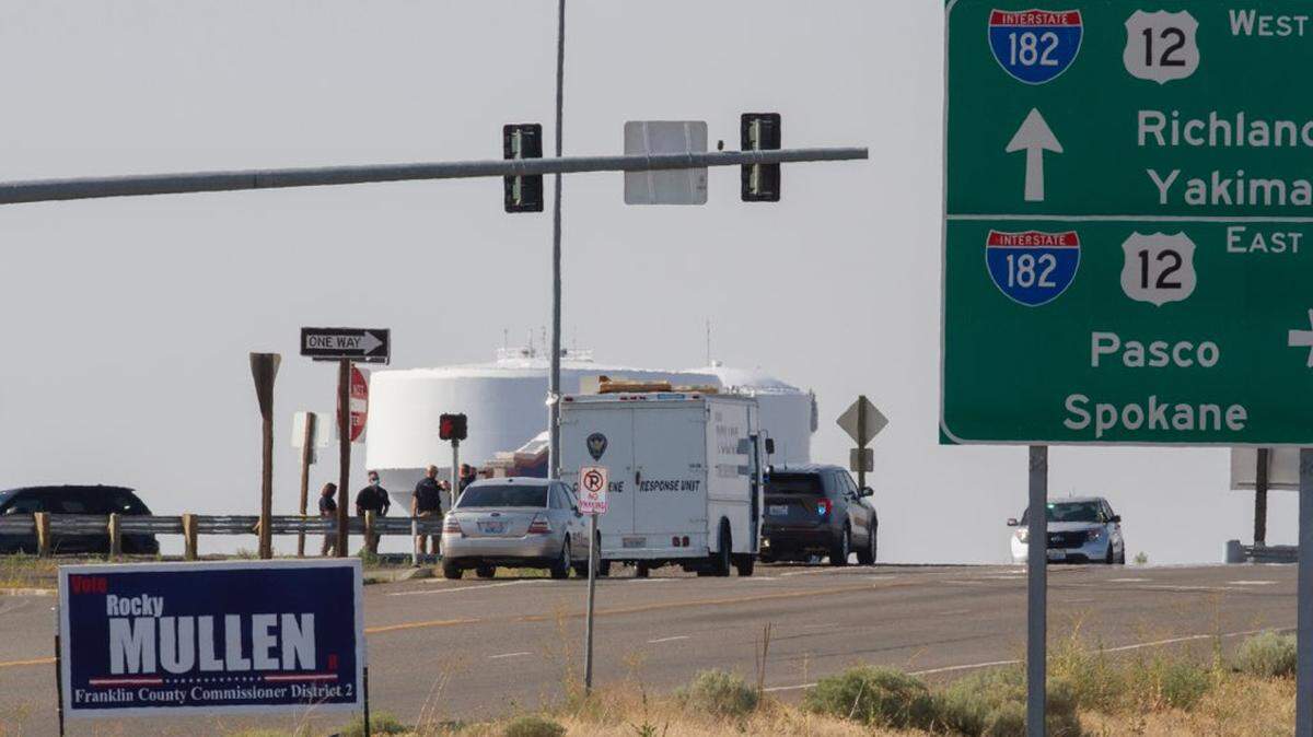 Police investigate an officer-involved shooting that occurred during a traffic stop on the Interstate 182 ramp from Road 68 in Pasco around 3 p.m. Thursday, July 30.
