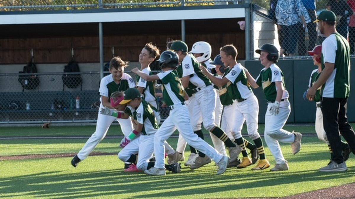 The Richland National Little League all-stars celebrate their state title on July 29 in Anacortes.