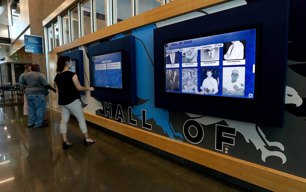 A new interactive hall of fame display featuring touch screens is prominently placed in the entry of the new 80,000-square-foot student recreation center at Columbia Basin College in Pasco.