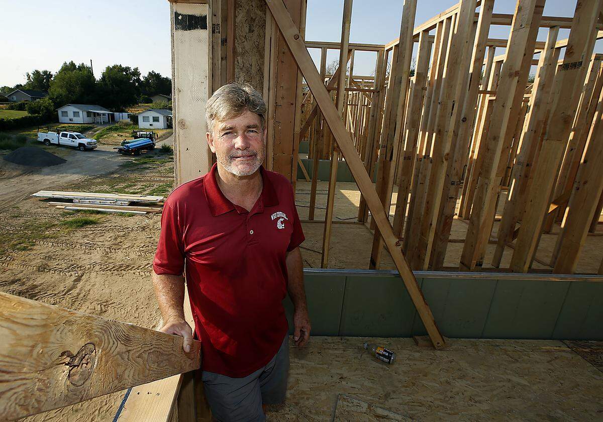 Retired teacher Steve Buckingham and his business partners are working on a $2 million townhome project in an area of Kennewick that once had prefabricated homes built for Hanford workers in the 1940s.