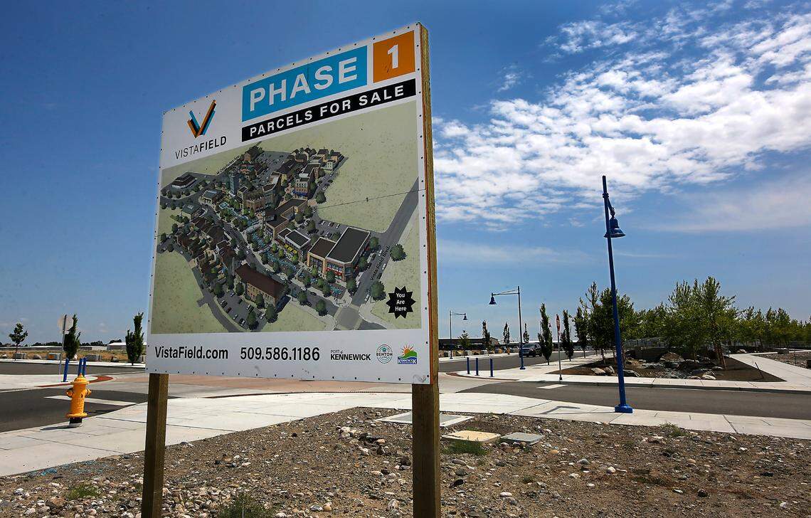 A sign in Vista Field advertises for the sale of parcels of land in Phase 1 part of the development of the former airport land.