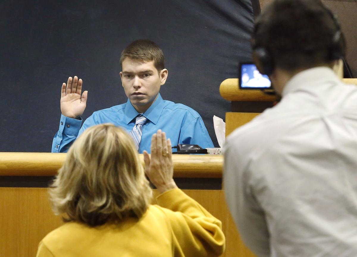 Martin Mendoza is sworn in Tuesday before giving a recorded video deposition in the second-degree murder case of Stephen Morfin in Benton County Superior Court. Mendoza previously pleaded guilty to being an accomplice. Watch videos at: tricityherald.com/video