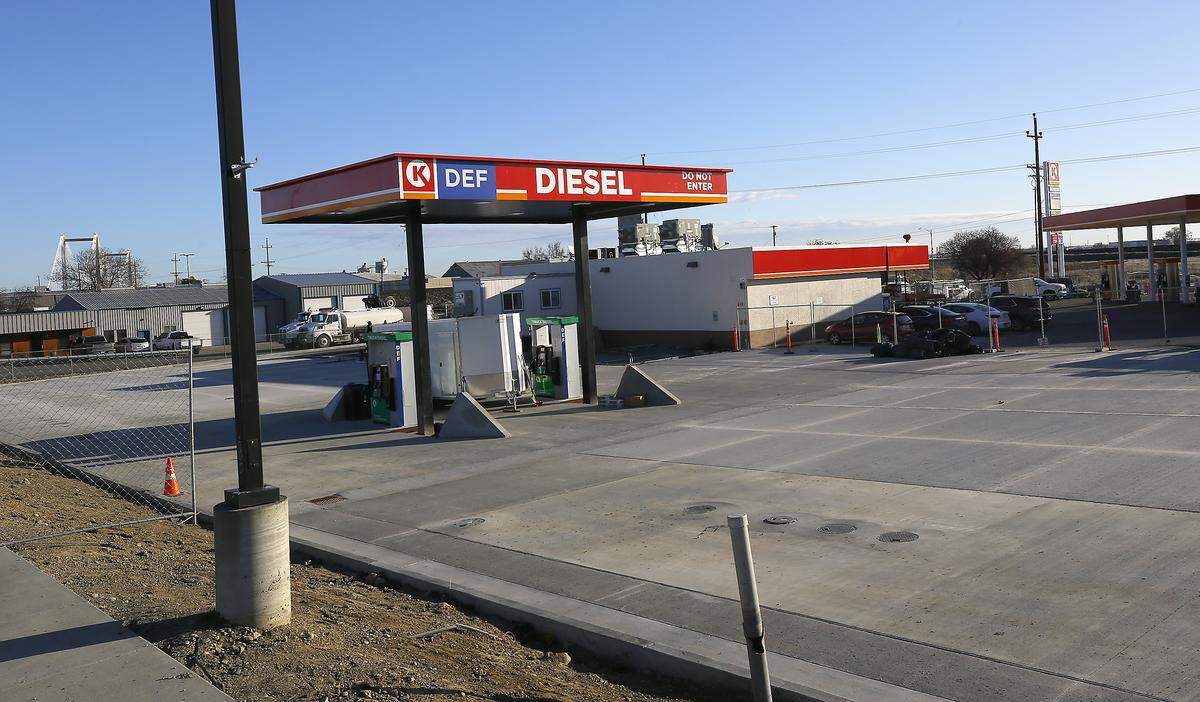 Temporary construction fencing surrounds a new diesel truck fueling station under construction at the Circle K at the intersection of East First Avenue and Gum street in east Kennewick.