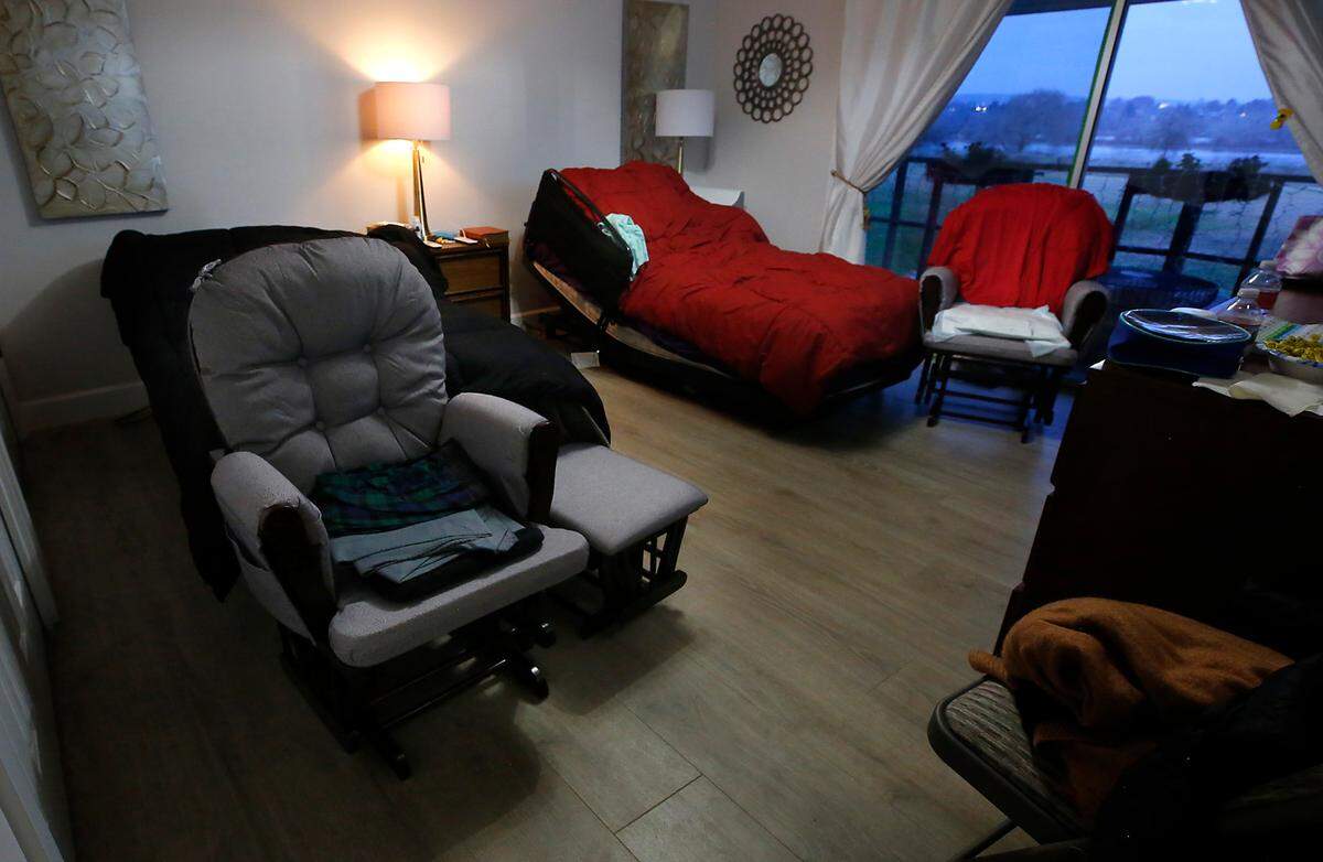 A pair new rocking chairs recently gifted to Lillian and Ernesto Parra sit on the bedroom of their temporary Pasco home. Their old rocking chairs were consumed by flames in their heavily fire damaged home.