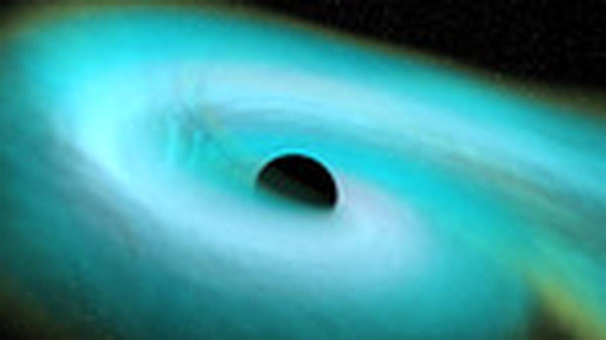 This artist’s rendition shows the disruption of a neutron star as it is swallowed whole by a black hole.