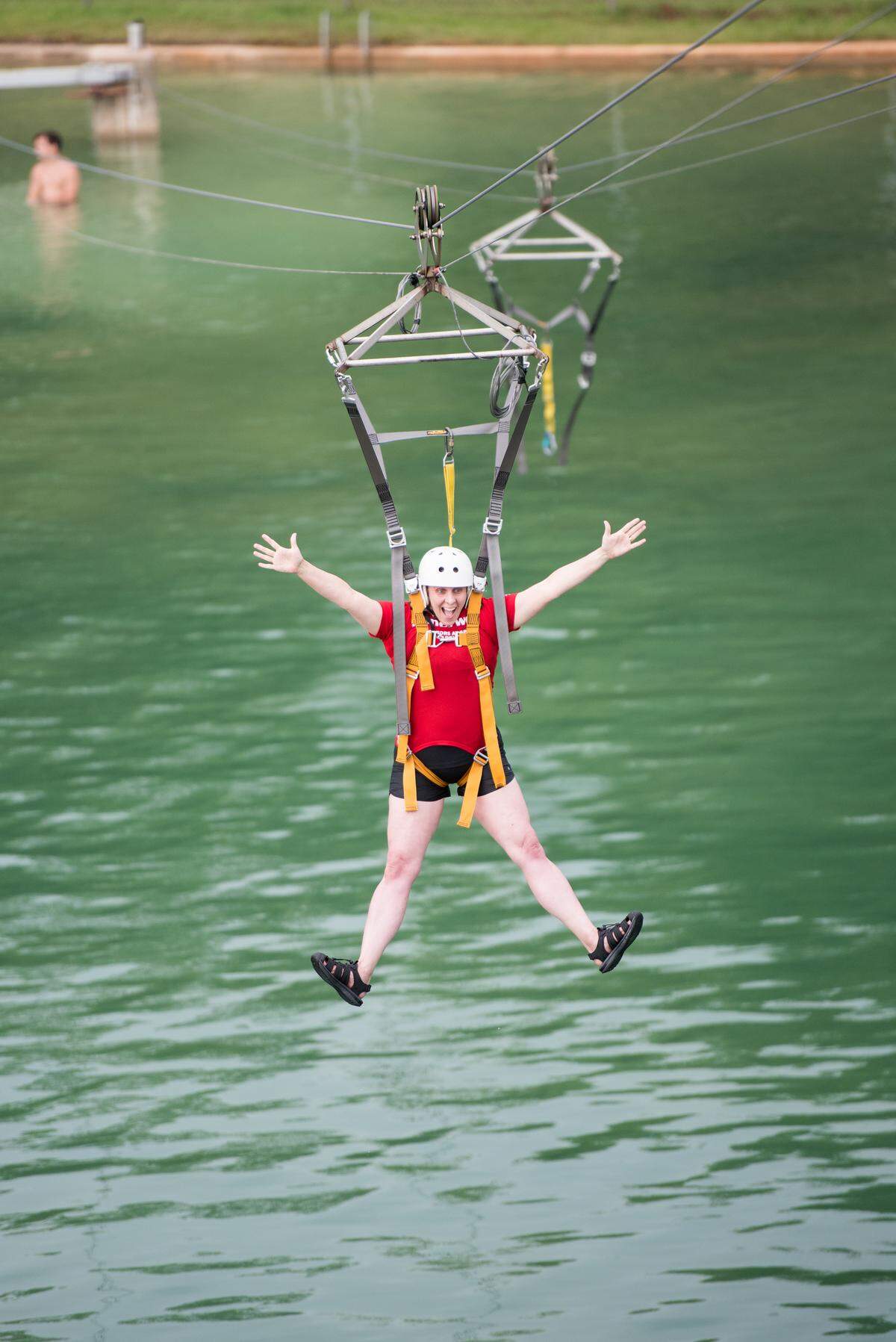 Pasco teacher Kim Van Eaton faces her fear of heights on the towering zipline at Honeywell Educators at Space Academy at the U.S. Space and Rocket Center in Huntsville, Ala. on June 23, 2018.