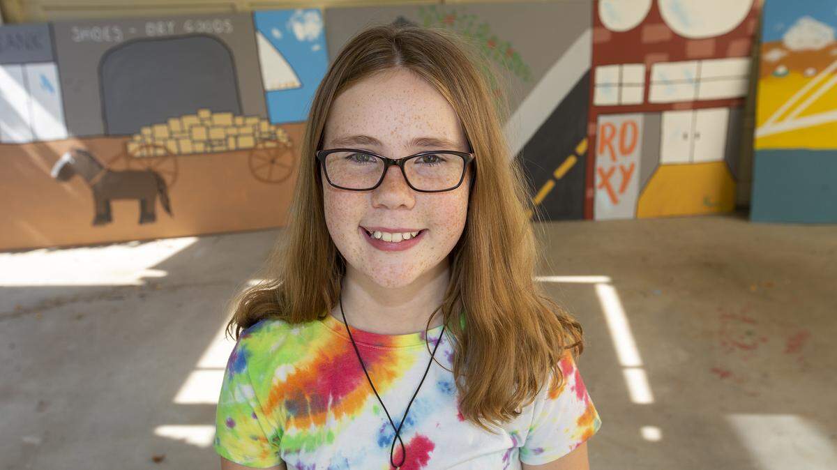 Kaelyn Myers was commissioned to paint three murals on downtown Kennewick’s past, present and future.