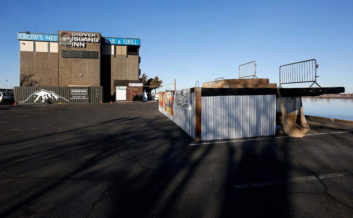 Outdoor stage at Clover Island Inn is made from two flatbed trailers parked side-by-side in the parking lot near the Columbia River in Kennewick.