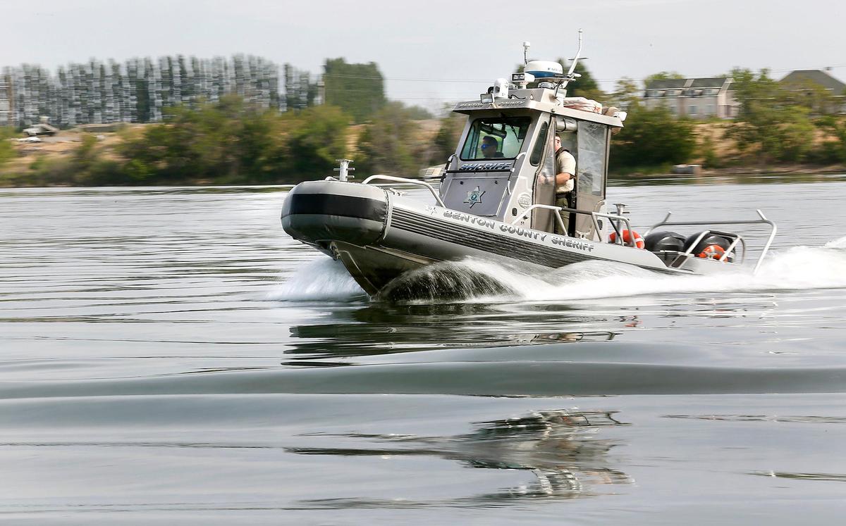 The Benton County Sheriff’s Office marine patrol boat is regularly operated by Deputies JP Benitez, left, and Brett Hansen on the Columbia River during the summer.