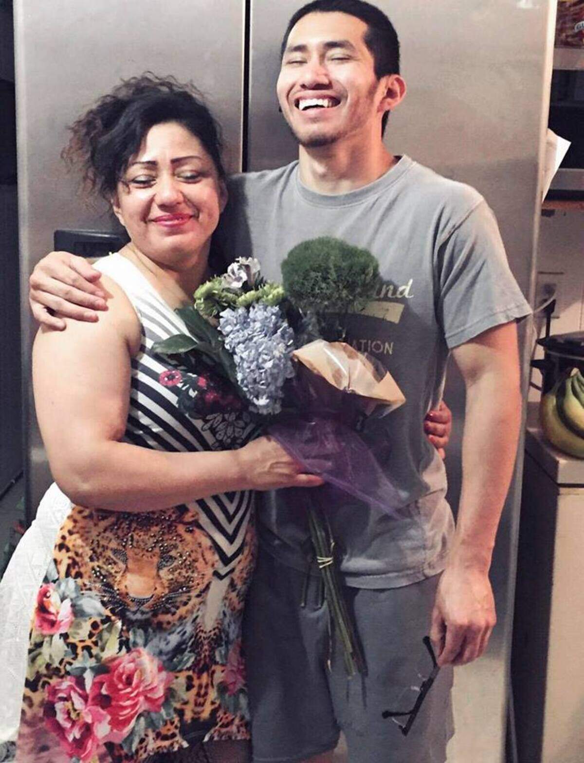 Mirna Gomez hugs her son Leo Gomez during a recent birthday for Leo in Basin City. The pair were arrested by ICE officers Wednesday.