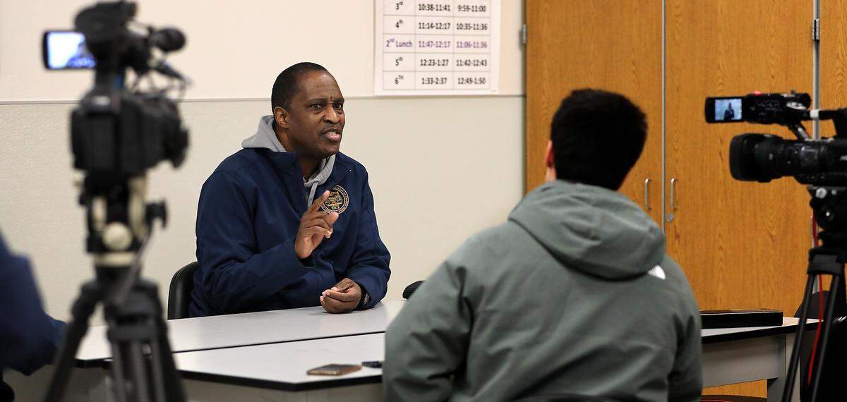 Irving Brown Sr., a local NAACP leader, holds a press conference Thursday night at Pasco High School about the recent brawl during a basketball game between the Pasco Bulldogs and Hanford Falcons.