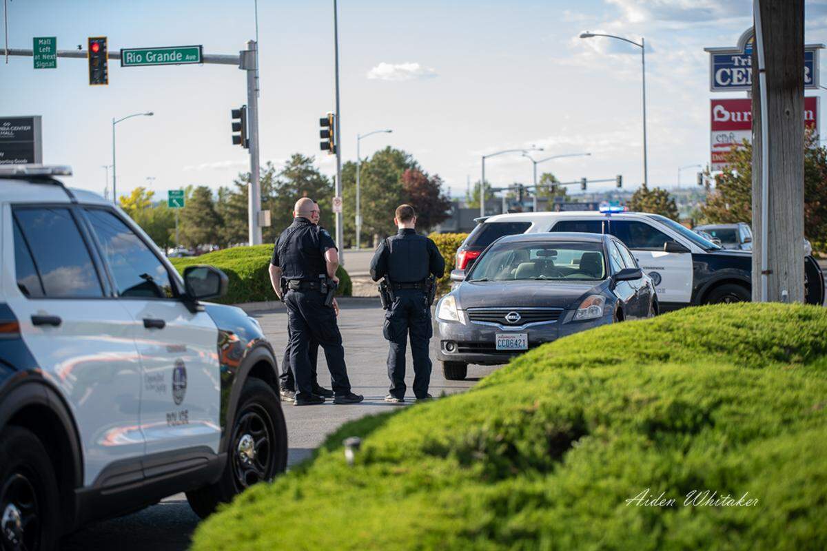 A man is in critical condition after being run over by a car in a Kennewick parking lot.