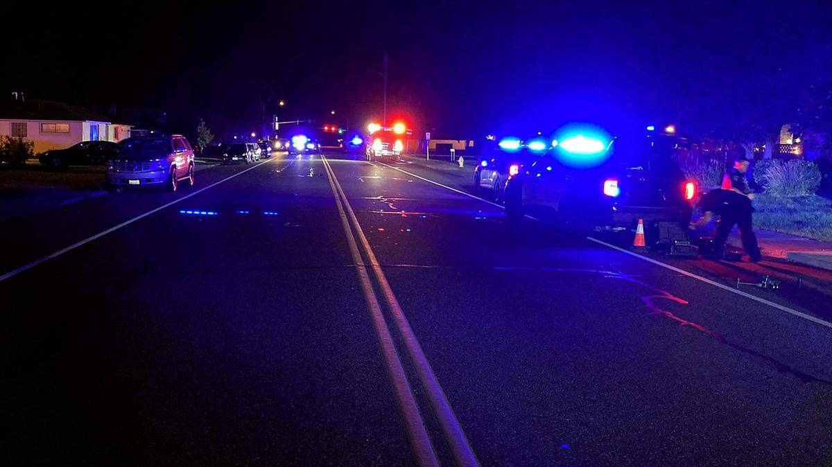 Kennewick police investigate the scene where a pedestrian was hit by a truck early Wednesday morning on the 400 block of North Yelm Street. 
